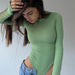 Color-Spring Round Neck Long Sleeve Bottoming Skinny Solid Color Sexy Siamese Top Women-Fancey Boutique